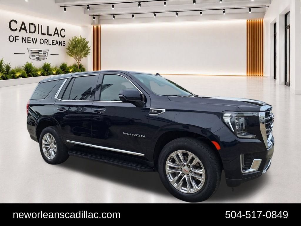 2023 GMC Yukon SLT in Midnight Blue Metallic — front three-quarter view