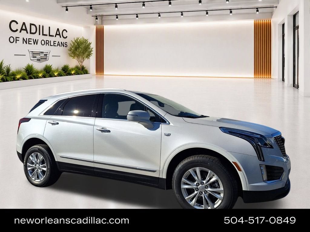 2026 Cadillac XT5 Luxury in Crystal White Tricoat — front three-quarter view