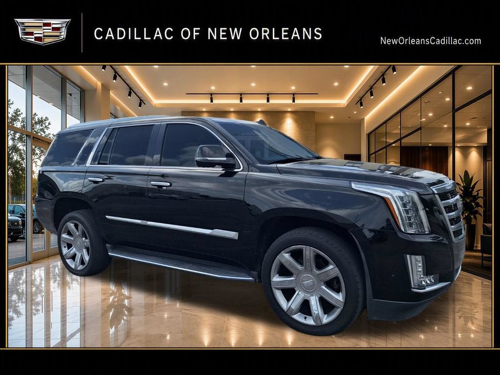 2020 Cadillac Escalade Premium Luxury in Black Raven — front three-quarter view