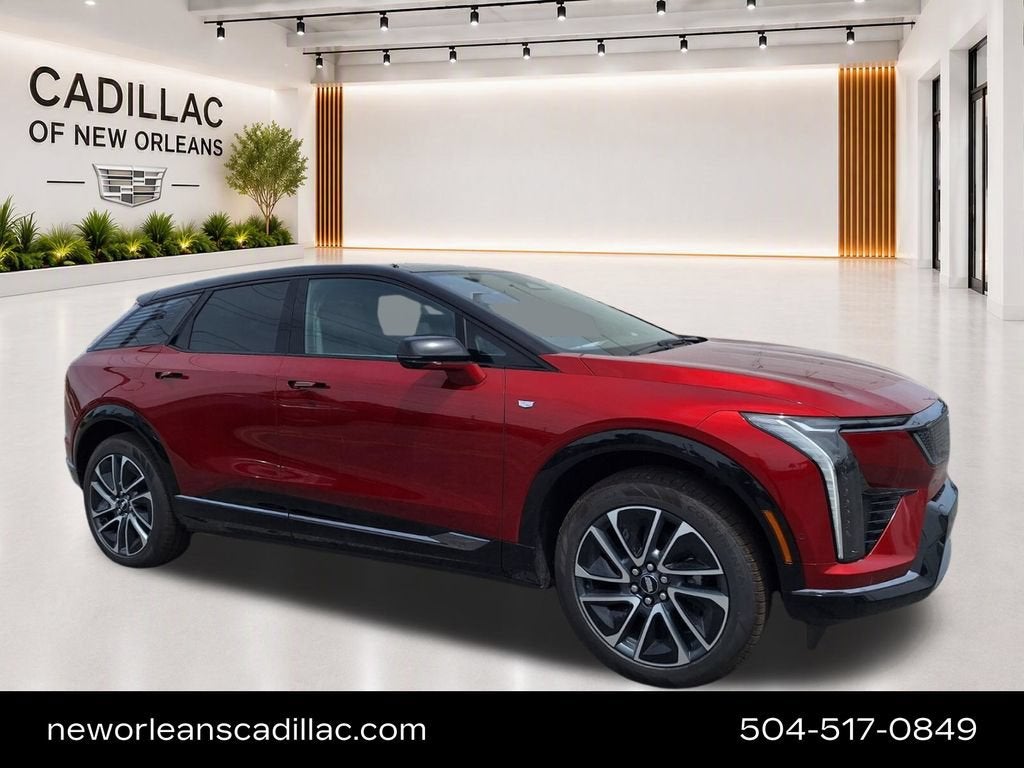 2026 Cadillac OPTIQ Sport in Radiant Red Tintcoat — front three-quarter view
