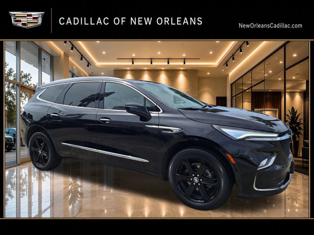 2023 Buick Enclave Essence in Ebony Twilight Metallic — front three-quarter view